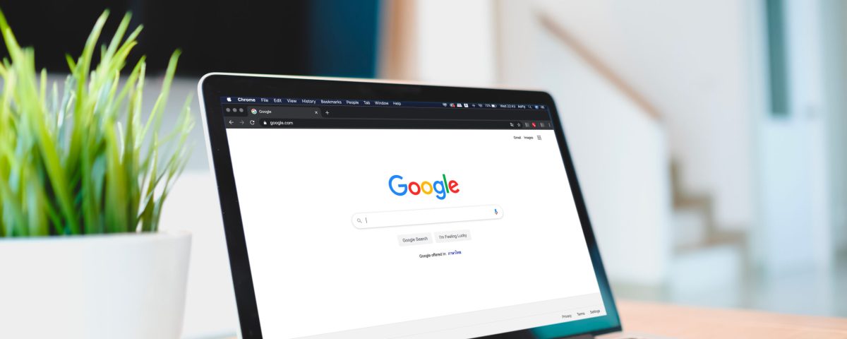 laptop computer displaying google logo scaled 1